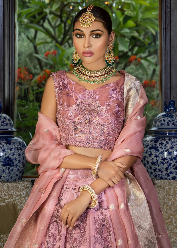 Latest Pakistani designer tea pink color lehnga dress for wedding