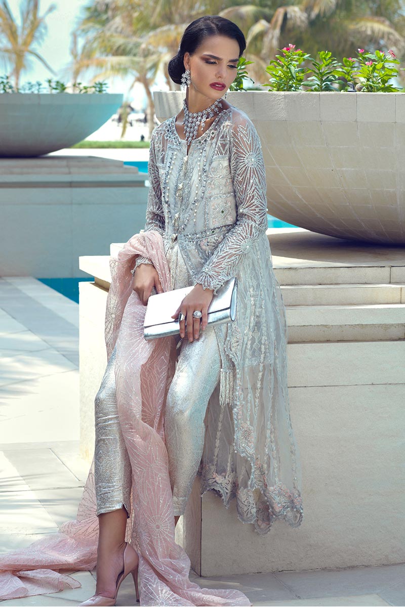 Latest designer net embroidered party dress in elegant white color # P2433
