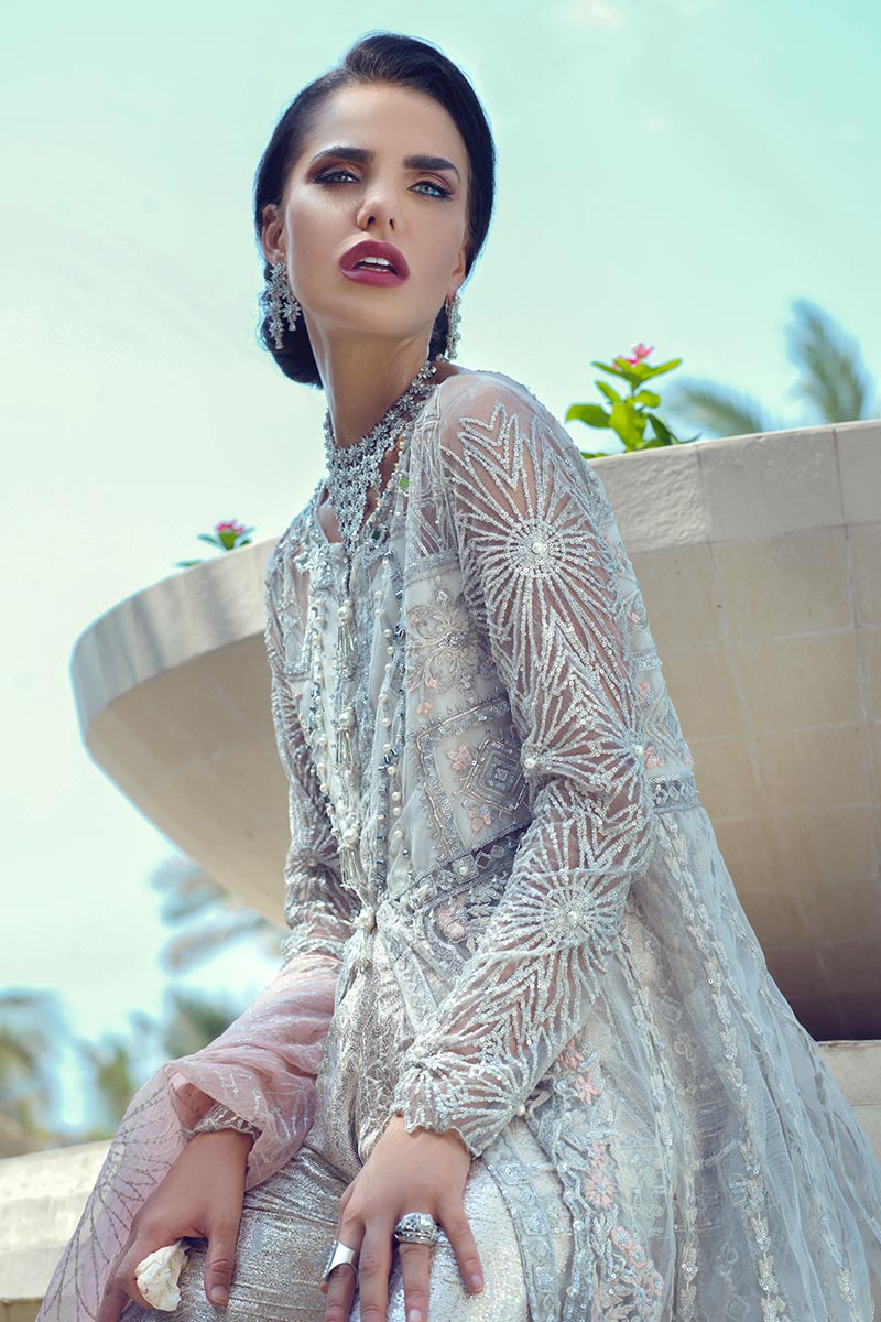 Latest designer net embroidered party dress in elegant white color # P2433
