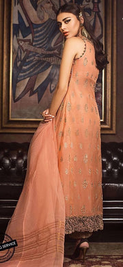 Elegant designer organza dress in peach color