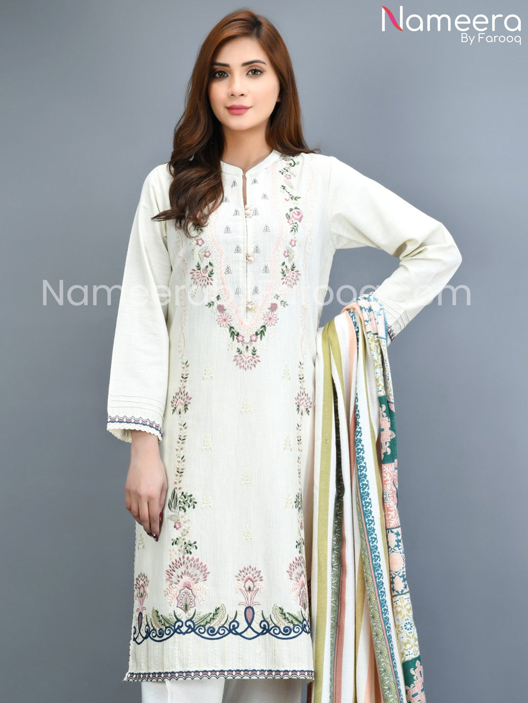 white  embrioded khaddar dress  1