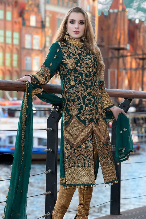 Pakistani designer zardozi embroidered dress in green color 